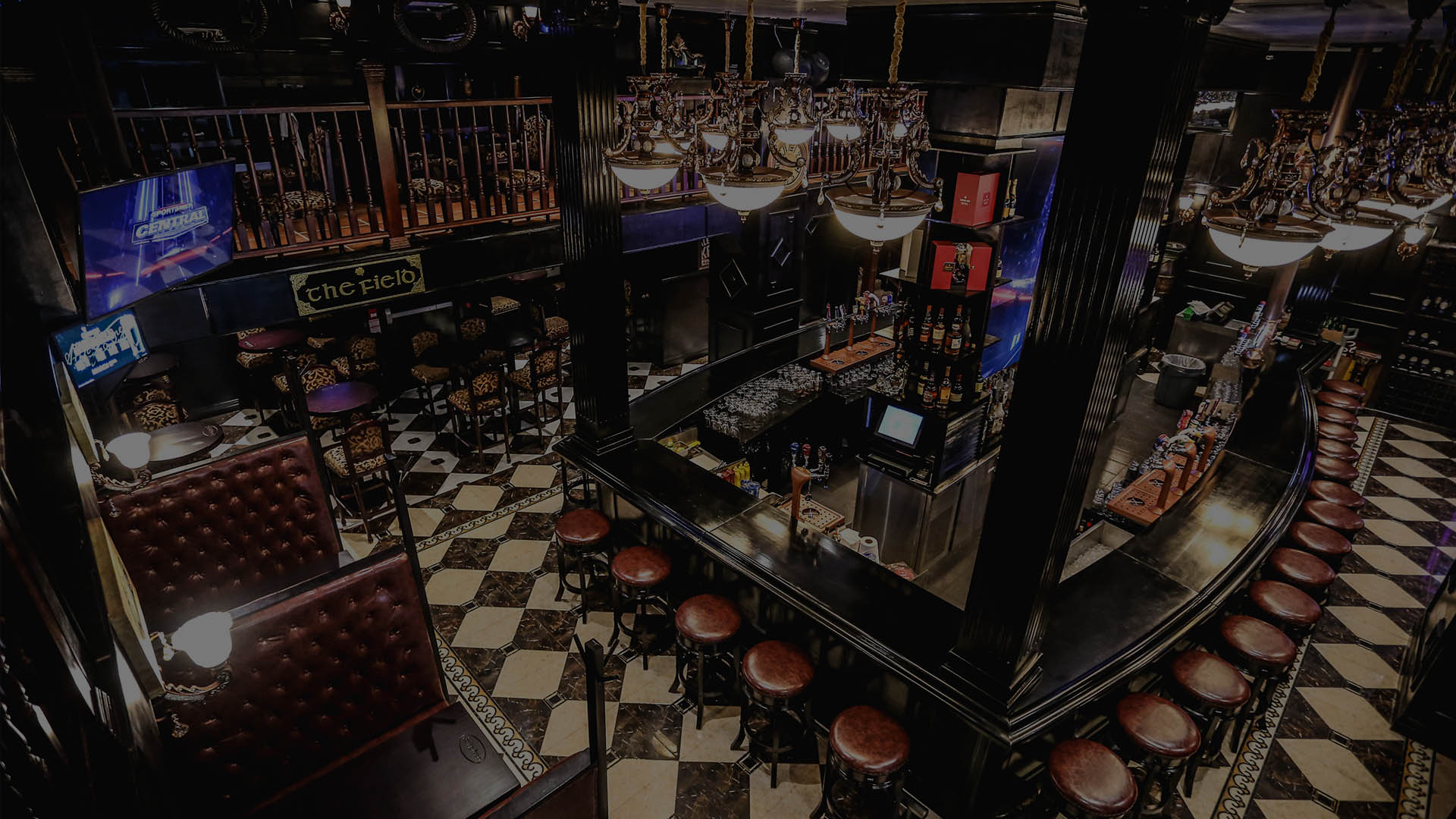 The bar and big screens at Lucky Clover